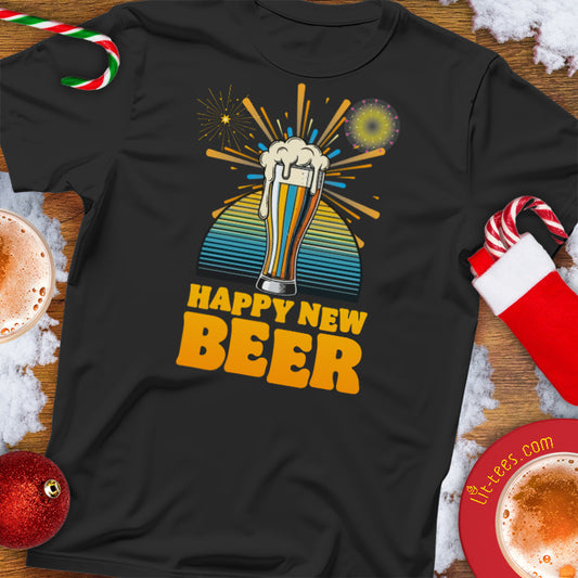 Black t-shirt with 'Happy New Beer' design on a festive background with Christmas decorations.