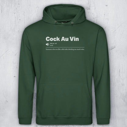 A dark green pullover hoodie with a white graphic print on the chest reading 'Sauvignon Blank' and funny definition-style text underneath, shown against a light gray textured wall.