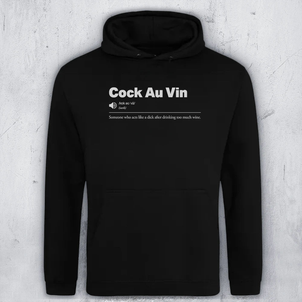 A black pullover hoodie with white printed text on the chest reading 'Cock Au Vin' and a humorous definition underneath, displayed against a textured light gray background.