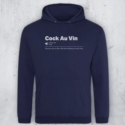 A navy blue pullover hoodie with a white graphic text print on the chest reading 'Cock Au Vin' with a dictionary-style definition underneath, displayed against a light gray textured background.
