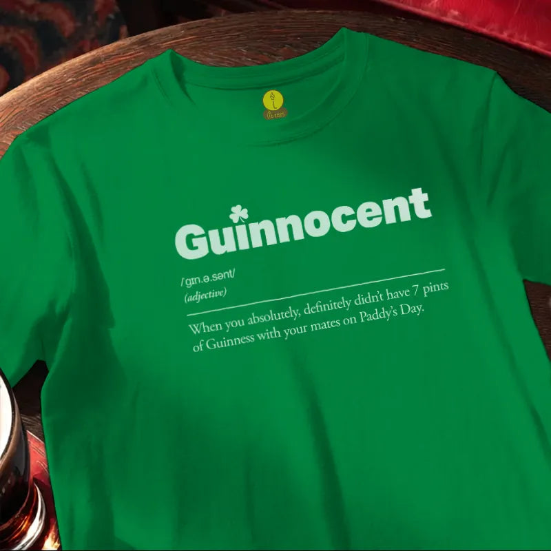 A green St Patrick's Day tee shirt reading: Guinnocent: When you absolutely, definitely didn't have 7 pints of Guinness with your mates on Paddy's Day.