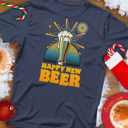Navy blue Christmas t-shirt with 'Happy New Beer' design on a festive background with drinks and decorations.