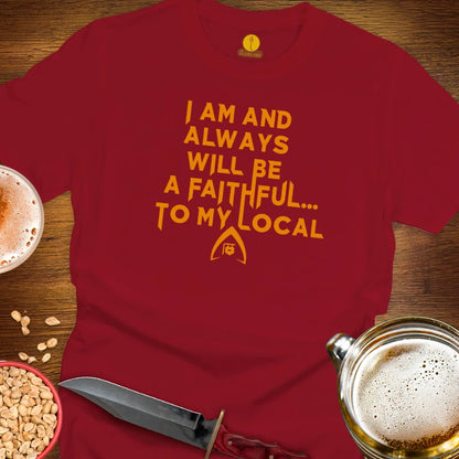 A red crewneck t-shirt with a yellow Star Trek-themed text graphic reading 'I AM AND ALWAYS WILL BE A FAITHFUL.