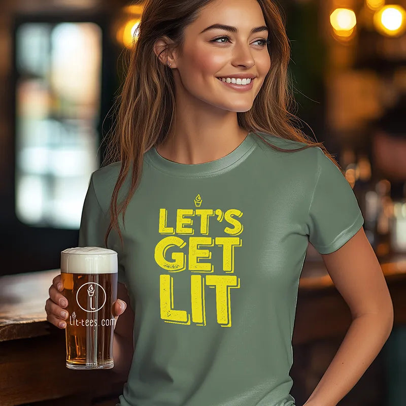 Woman wearing a green t-shirt with 'LET'S GET LIT' text, holding a beer in a bar setting.