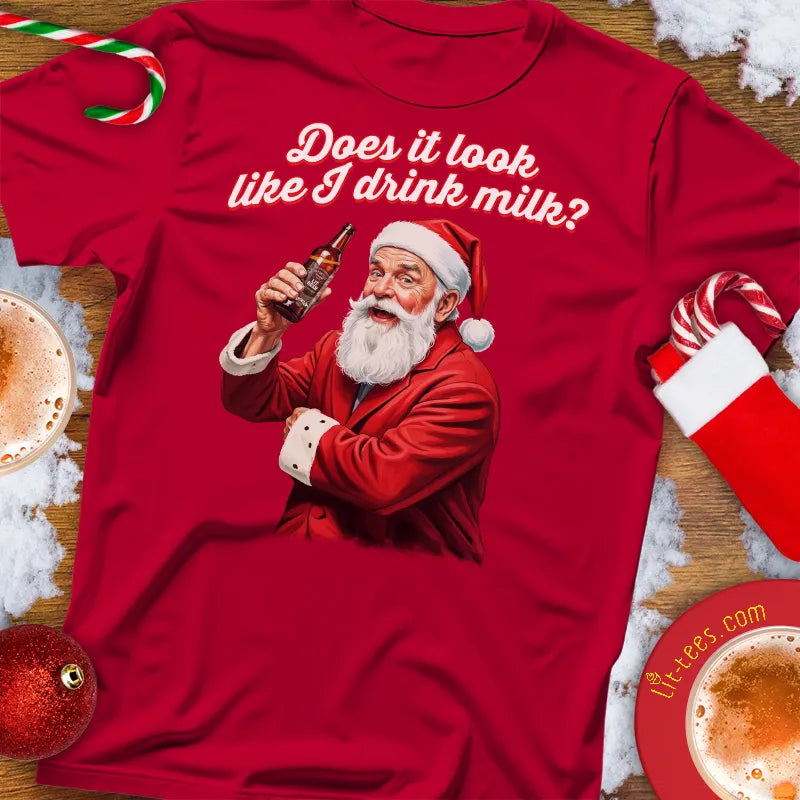 Red  Christmas t-shirt with Santa Claus holding a bottle and text 'Does it look like I drink milk?' on a festive background.