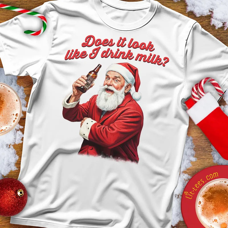 White Christmas t-shirt with Santa Claus holding a beer and text 'Does it look like I drink milk?' on a festive background.