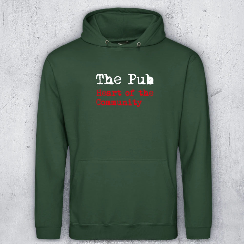 A dark green pullover hoodie with 'The Pub' and 'Heart of the Community' printed on the chest, displayed against a textured light gray background.