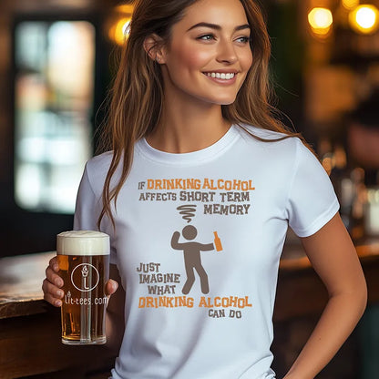 Woman holding a beer in a bar wearing a white tee shirt with a graphic character and humorous text saying 'If drinking alcohol affects short term memory just imagine what drinking alcohol can do' 