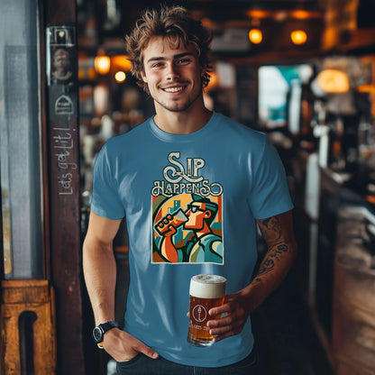 Man wearing an indigo blue t-shirt with a graphic design of a beer mug and text, holding a beer in a bar setting.