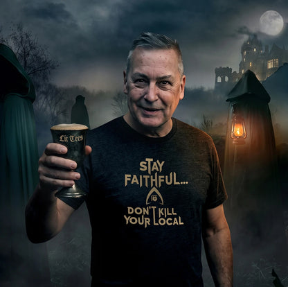 A man wearing a black graphic t-shirt with the text 'STAY FAITHFUL.